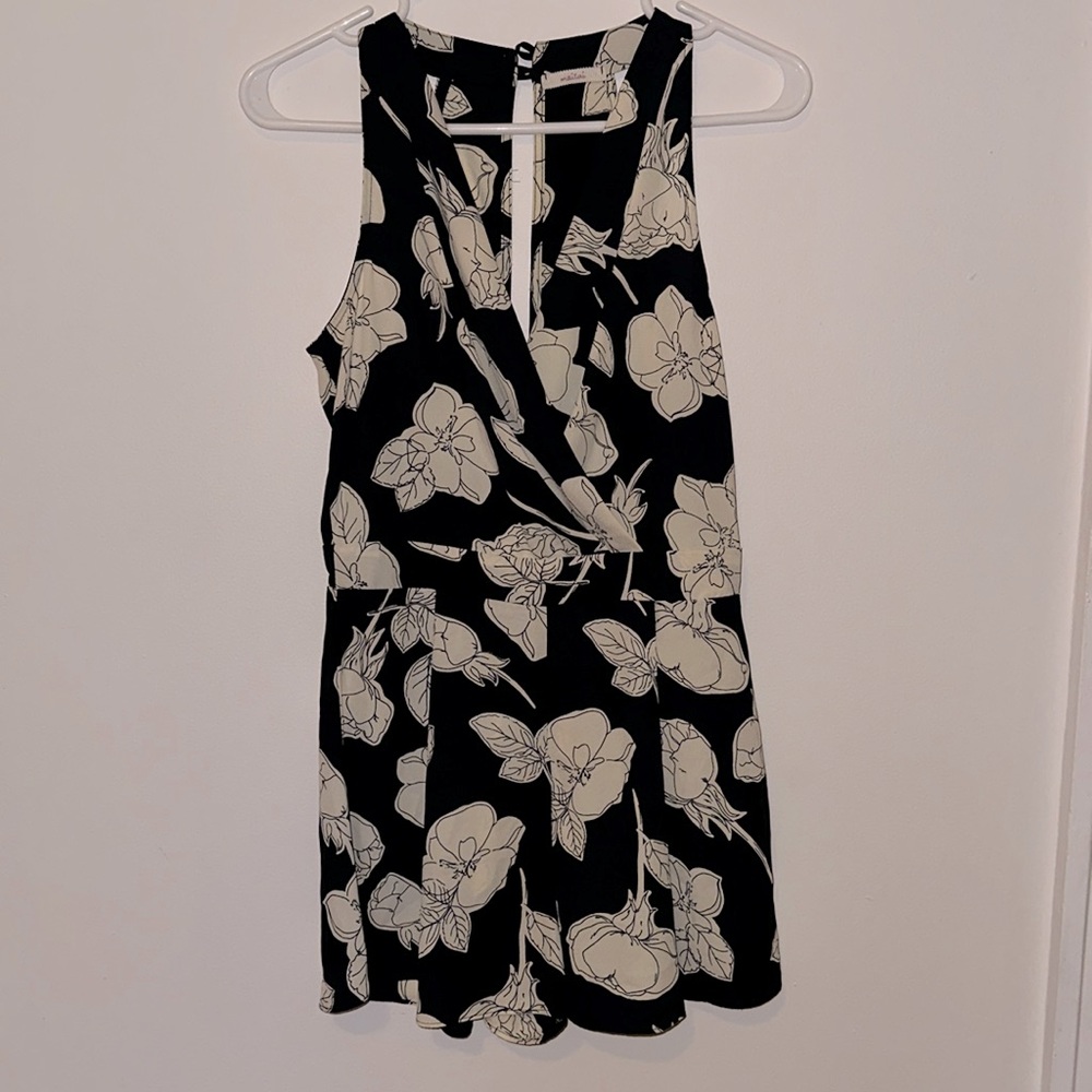 NWOT - Open back Navy with white flowers romper